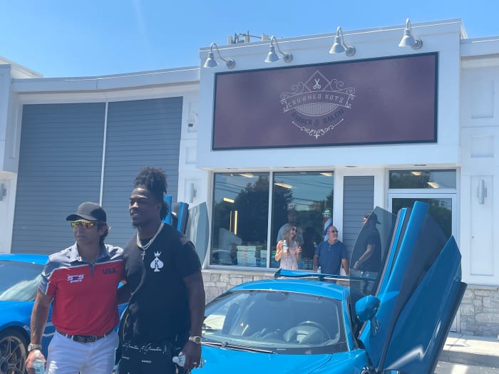 Sean Stellato and Brandon King in front of Crowned Kutz, Foxboro's latest barbershop and salon. (Ethan Hurwitz/Patriots Country)